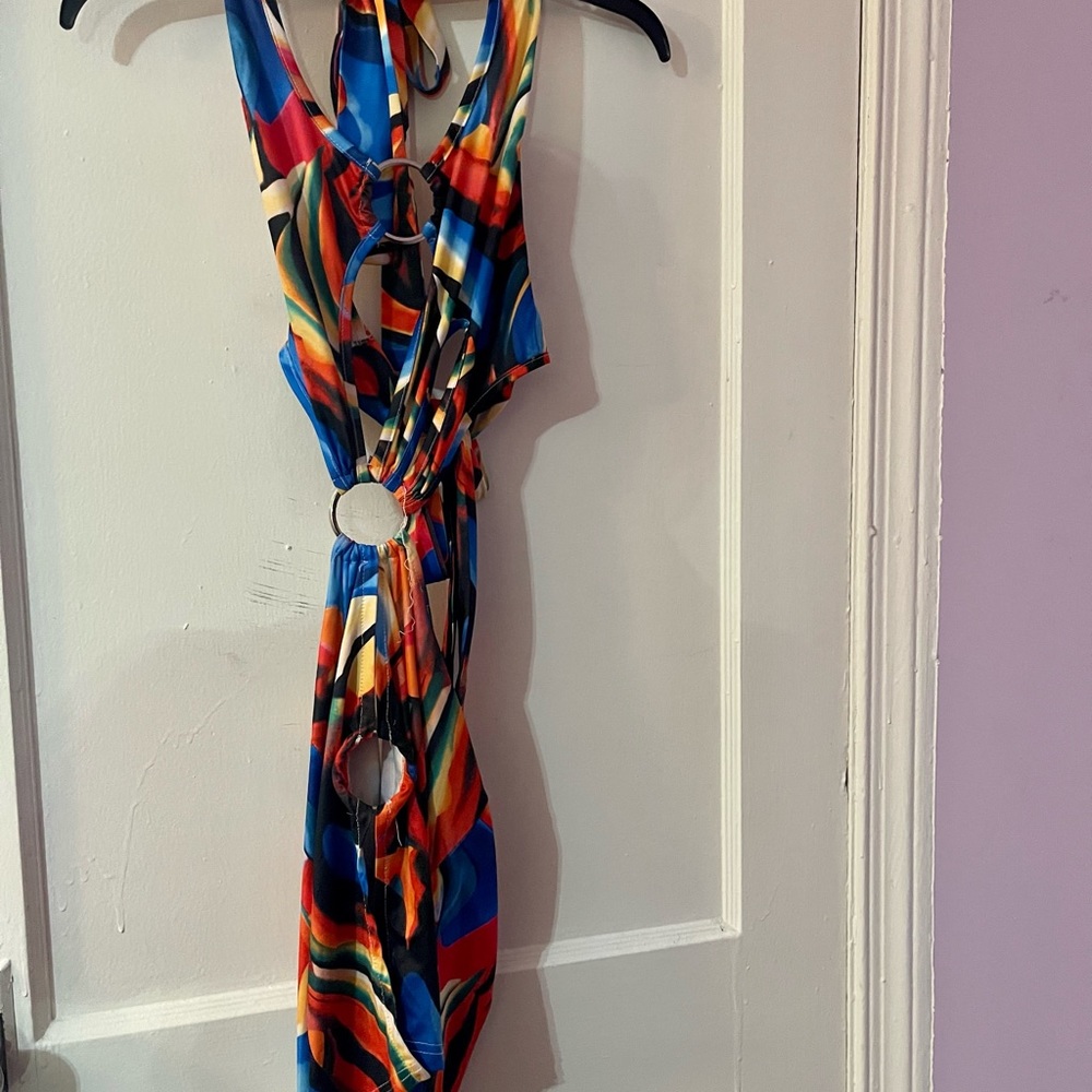 Geometric cut out w/ metal circles hardware mini dress| Color: red/ multi